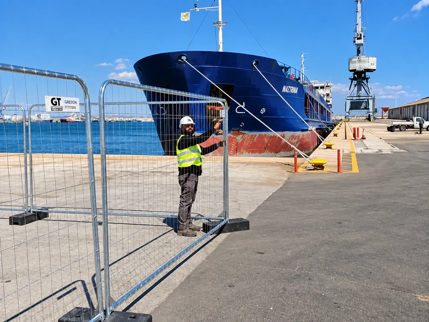 Temporary site fencing being installed at a port